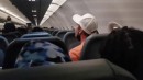 Stressiger Typ im Flugzeug