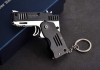 Schlüsselanhänger-Pistole